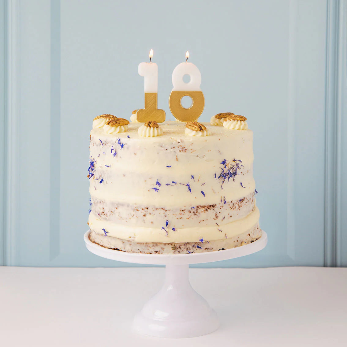 Velas con número 8 de cumpleaños blanca y dorada