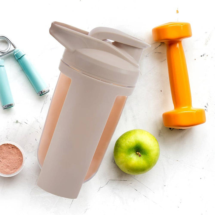 Botella shaker de proteína Tritan con bola mezcladora beige 700 ml 128709