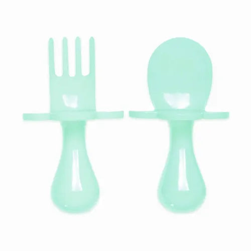 Set de cubiertos verdes ergonómicos para bebé con sistema de seguridad