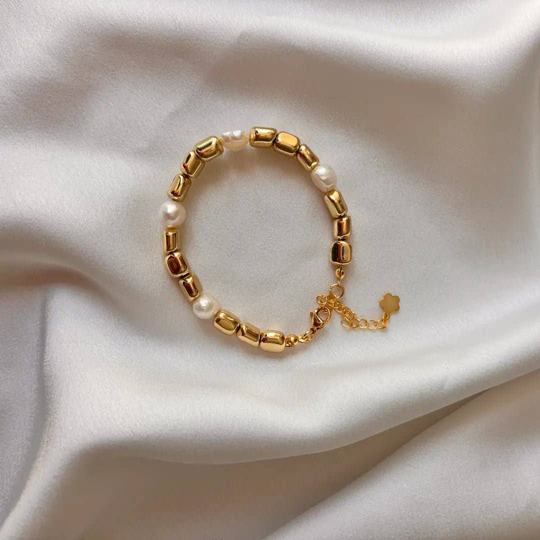 Costa d’Oro - Pulsera de Hematita y Perlas de Agua Dulce facetadas