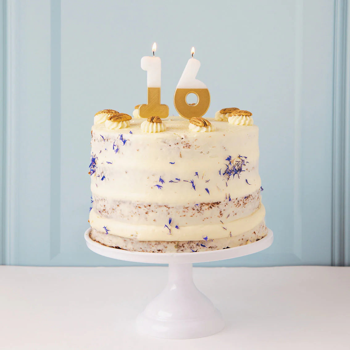 Velas con número 6 de cumpleaños blanca y dorada