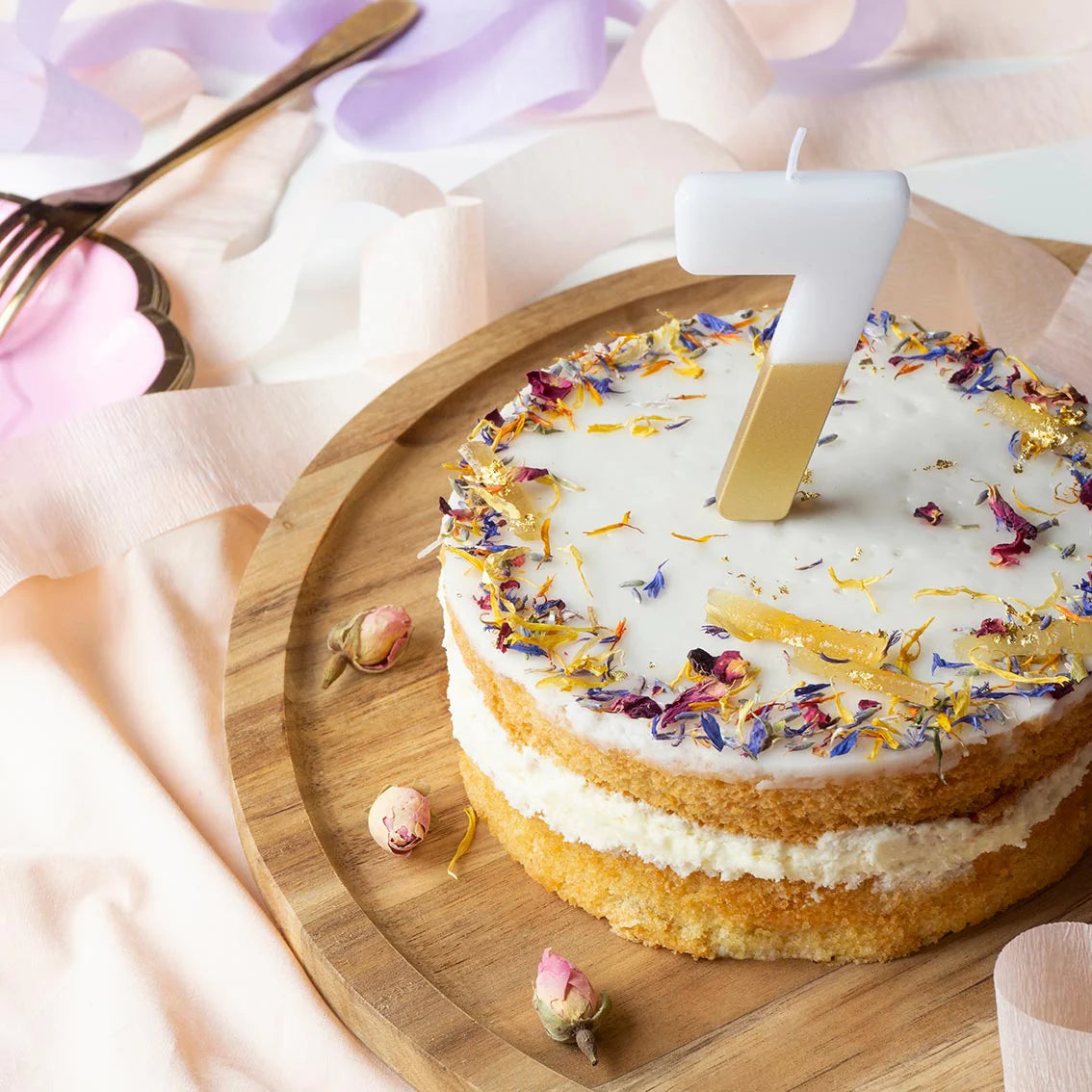 Velas con número 7 de cumpleaños blanca y dorada