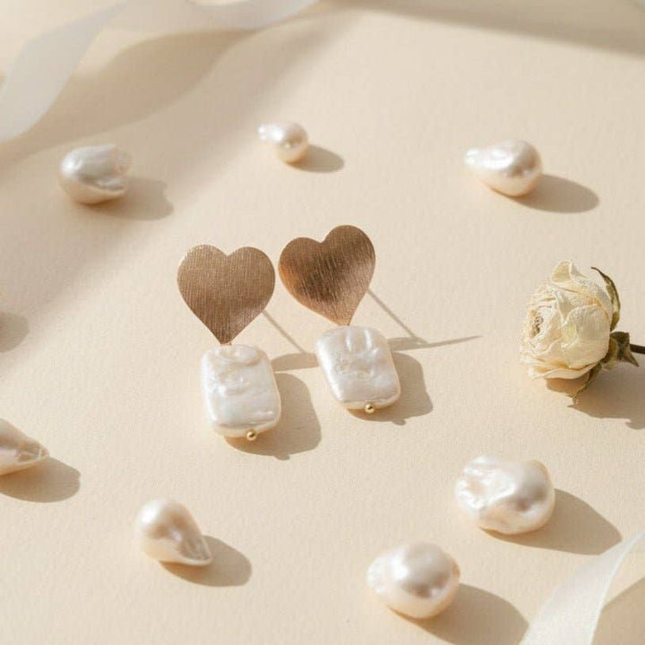 Pendientes Cuore di Perla con corazón chapado en oro y perla