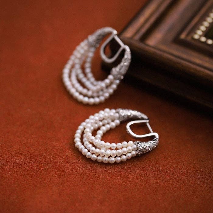 Pendientes de cadena de perlas de varias capas
