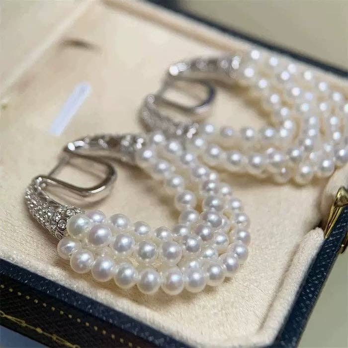 Pendientes de cadena de perlas de varias capas